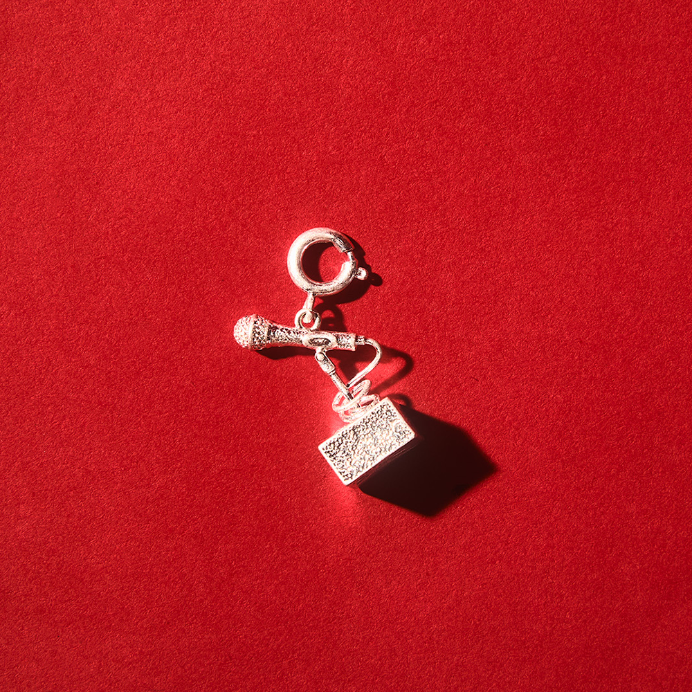Loveland Charm Bracelet & Game Piece Set microphone